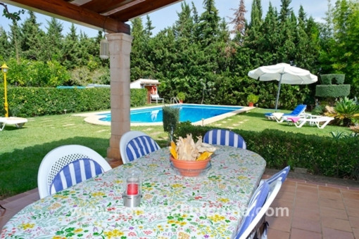 Covered terrace overlooking the pool