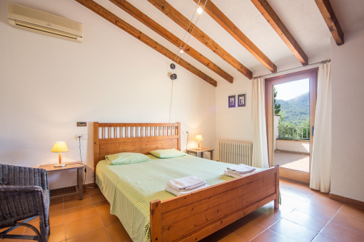 Bedroom with balcony