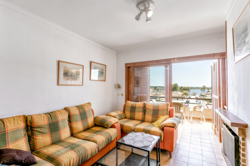 Living area with sea views and access to the balcony