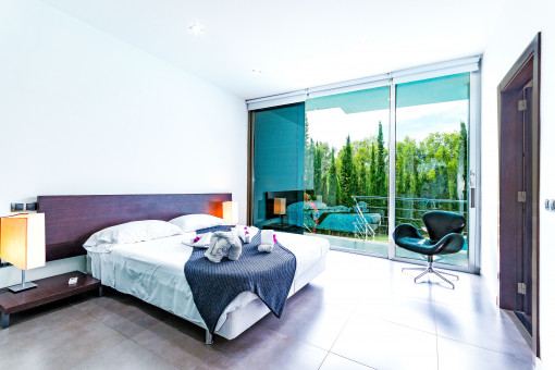 Bedroom with balcony on the upper floor