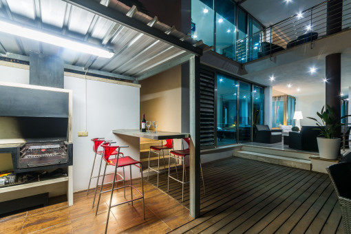 Elegant outdoor kitchen by night
