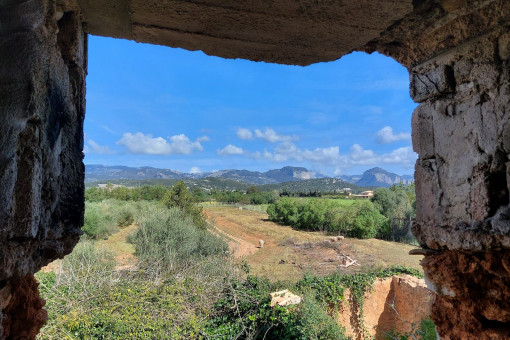 Rustic finca building plot with a stone house requiring restoration in Consell