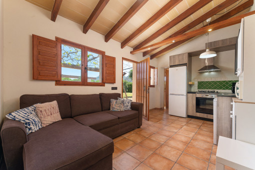 Living-dining area with open kitchen in the guest house
